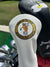 White golf club head cover with a logo on a white background