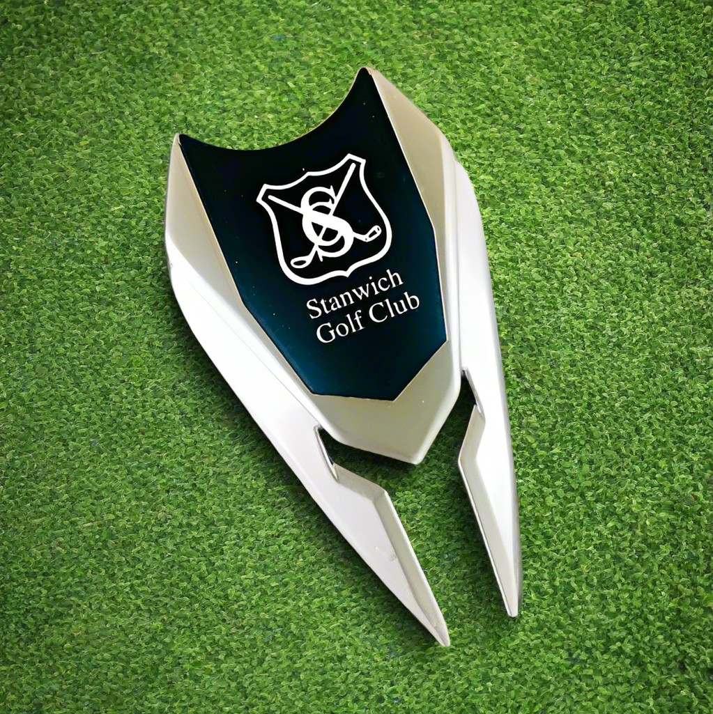 Custom golf divot tool with magnetic logo marker.