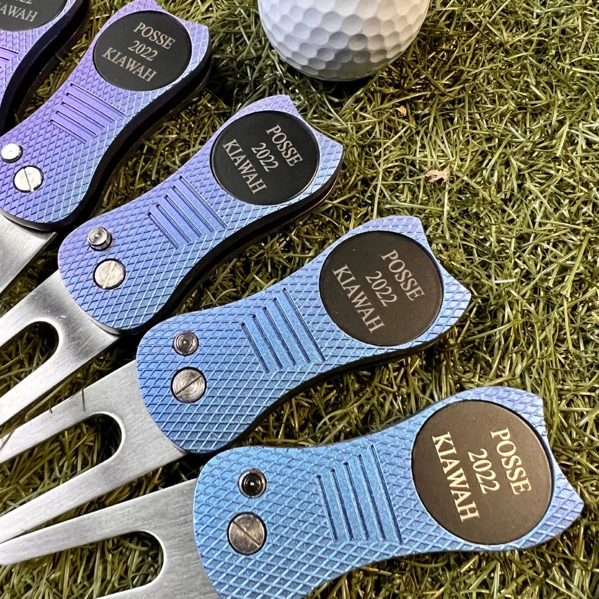 Custom divot tool with magnetic logo ball marker.