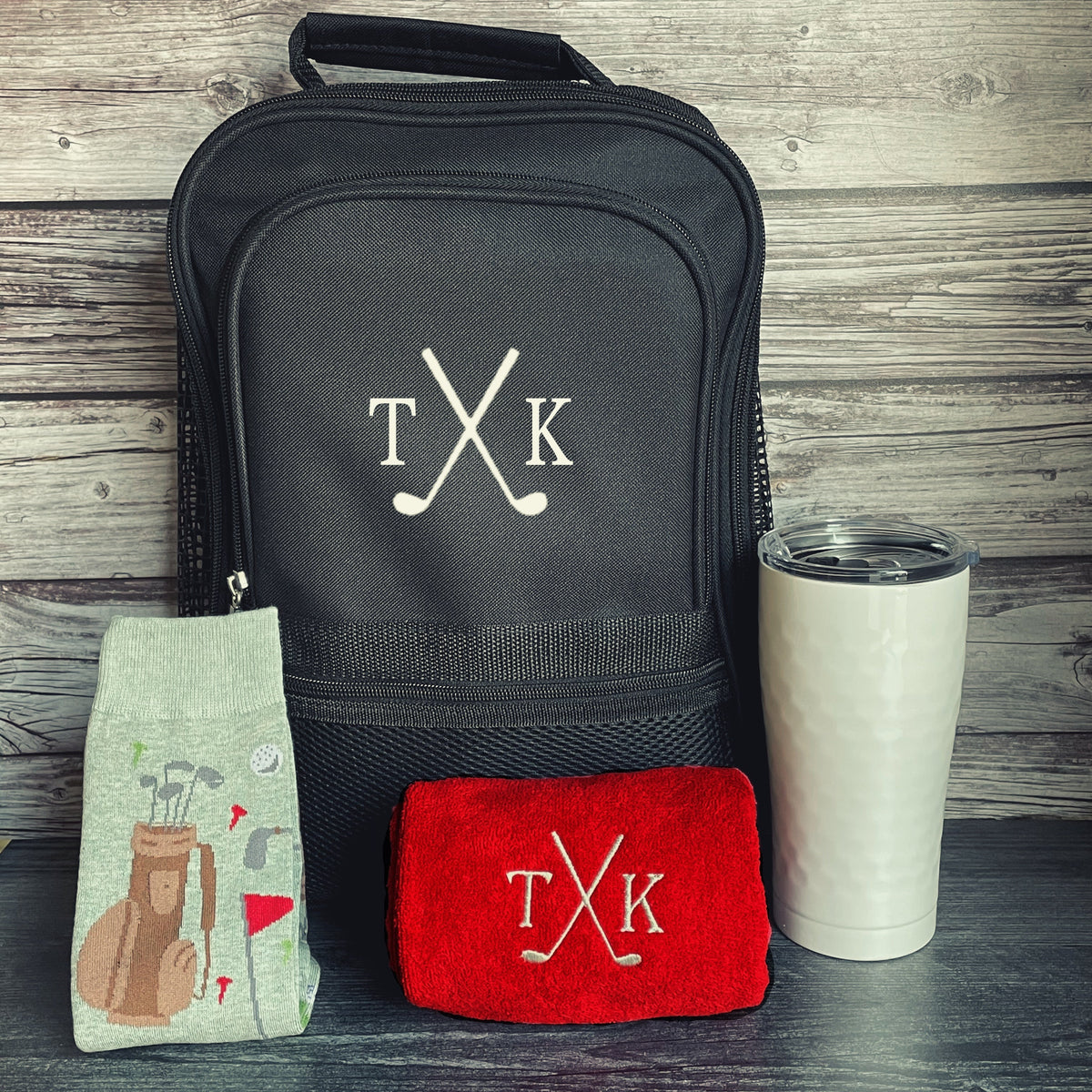 Custom golf gift set with personalized shoe bag, towel, tumbler, and socks