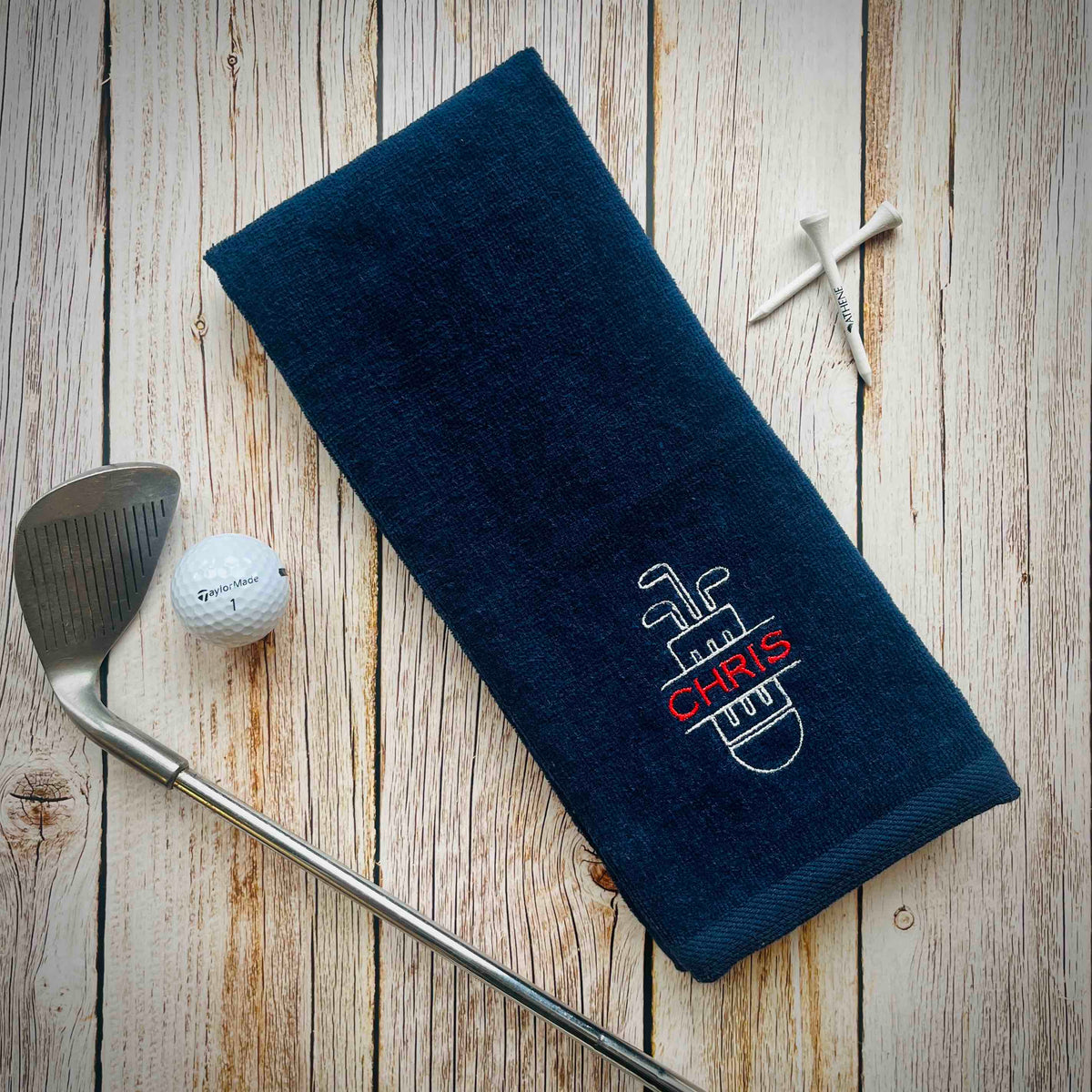 Personalized golf towel with custom embroidery and golf bag design