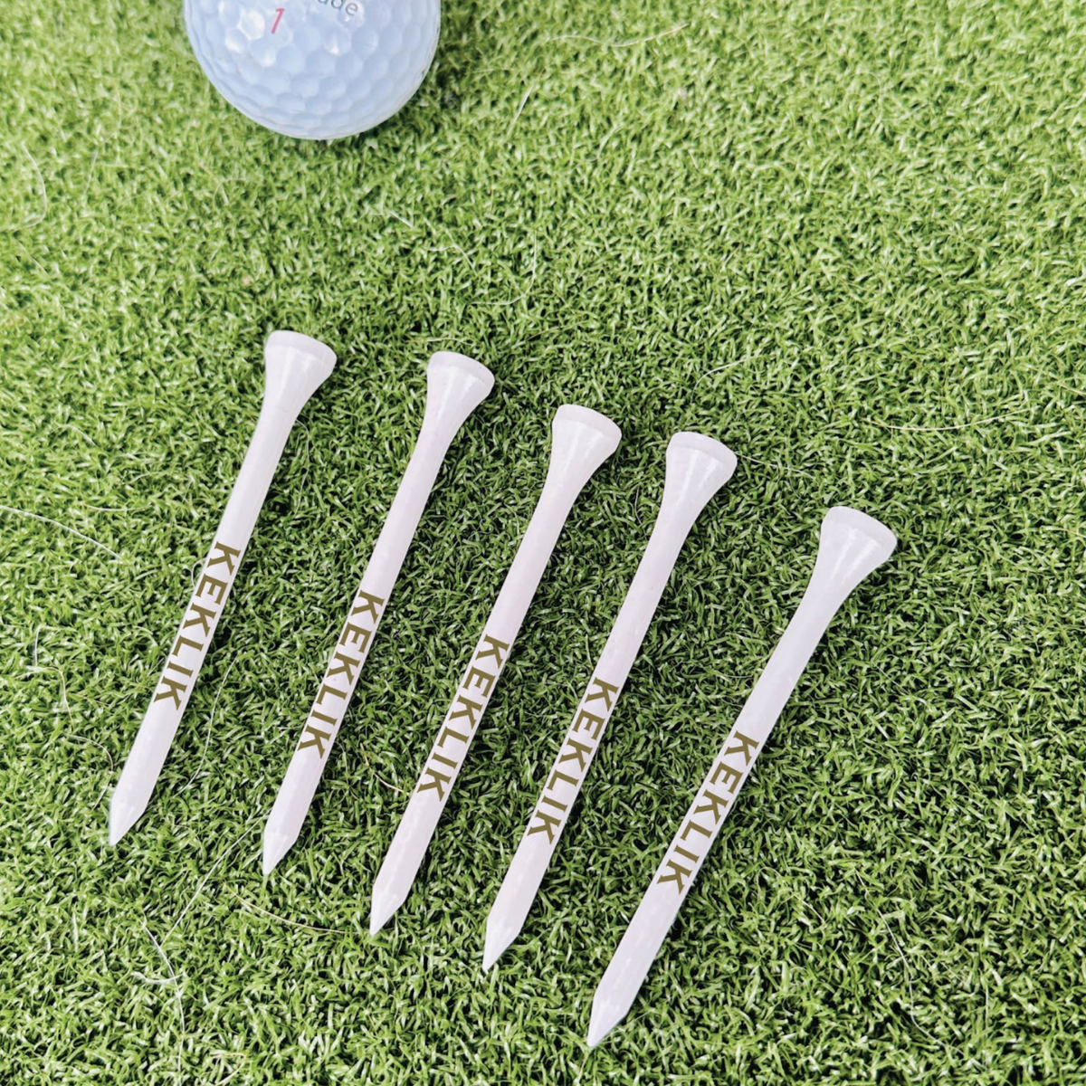 Personalized wooden golf tees with custom engraving