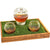 Handcrafted golf ball whiskey decanter set with glasses and wooden stand.