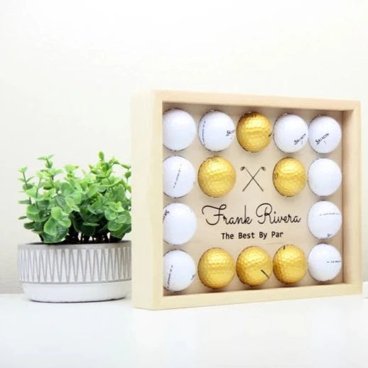 Customizable wooden golf ball display frame holding 16 balls.